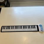 Mukikim Rock And Roll It Classic Roll-up Keyboard W/ 49 Keys & Built In Speaker. Fixed Price $20.00.